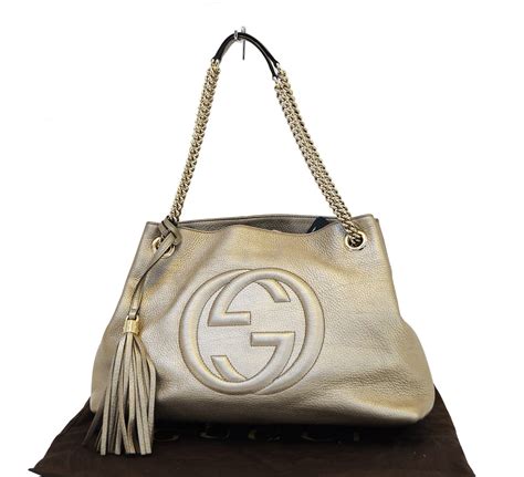 white gucci purse with gold chain|Gucci small bag with chain.